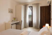 A bed or beds in a room at TERRA TERRA - Masseria Minunni