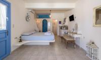 Posteľ alebo postele v izbe v ubytovaní Blu Suites and Studios