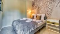 Posteľ alebo postele v izbe v ubytovaní Apartamenty Centrum - Wyszyńskiego 9 by Royal Aparts