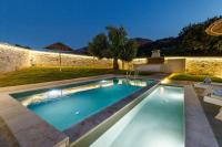The swimming pool at or close to Georgioupoli Villa with heated private pool and BBQ