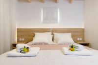 A bed or beds in a room at Georgioupoli Villa with heated private pool and BBQ