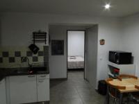 A cozinha ou cozinha compacta de SYMPATHIQUE APPARTEMENT