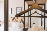 A bed or beds in a room at Garay