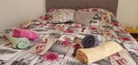 Posteľ alebo postele v izbe v ubytovaní Apartmani Sonia