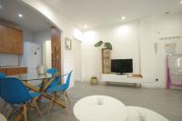 Televízia a/alebo spoločenská miestnosť v ubytovaní Livingtarifa Apartamento Coco