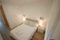 Posteľ alebo postele v izbe v ubytovaní Livingtarifa Apartamento Coco