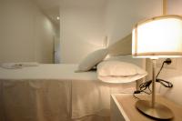 Posteľ alebo postele v izbe v ubytovaní Livingtarifa Apartamento Coco