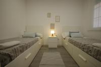 Posteľ alebo postele v izbe v ubytovaní Livingtarifa Apartamento Coco