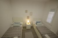 Posteľ alebo postele v izbe v ubytovaní Livingtarifa Apartamento Coco