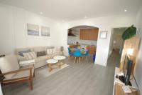 Televízia a/alebo spoločenská miestnosť v ubytovaní Livingtarifa Apartamento Coco