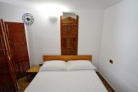 Posteľ alebo postele v izbe v ubytovaní Umbra Idris Holiday Home