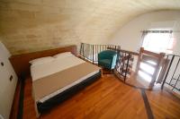 Posteľ alebo postele v izbe v ubytovaní Umbra Idris Holiday Home