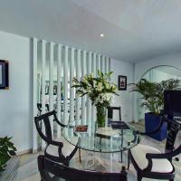 A seating area at Hotel Suites Albayzin Del Mar