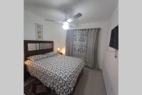 Postel nebo postele na pokoji v ubytování Confortable apartamento de 3 tres habitaciones, con hermosa vista de area verde, ademas de piscinas y juegos infantiles en area recreativa