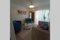 Posezení v ubytování Confortable apartamento de 3 tres habitaciones, con hermosa vista de area verde, ademas de piscinas y juegos infantiles en area recreativa