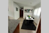 Posezení v ubytování Confortable apartamento de 3 tres habitaciones, con hermosa vista de area verde, ademas de piscinas y juegos infantiles en area recreativa