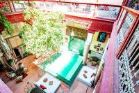 an overhead view of a swimming pool in a building at Riad Chorfa in Marrakesh