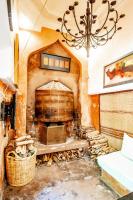 a large wood fired oven in a room at Riad Chorfa in Marrakesh