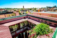 a view of a city from the roof of a building at Riad Chorfa in Marrakesh