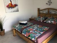 Postel nebo postele na pokoji v ubytování Priscilla Apartment