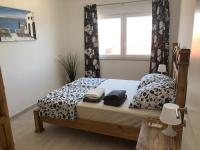 Postel nebo postele na pokoji v ubytování Priscilla Apartment