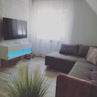 TV a/nebo společenská místnost v ubytování Ferienwohnung Lavanda