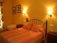 Postel nebo postele na pokoji v ubytování Hotel San Francisco Rural