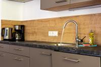 Kuchnia lub aneks kuchenny w obiekcie Fourteen Zell am See S&P by All in One Apartments