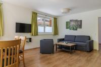 Telewizja i/lub zestaw kina domowego w obiekcie Fourteen Zell am See S&P by All in One Apartments