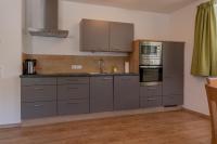 Kuchnia lub aneks kuchenny w obiekcie Fourteen Zell am See S&P by All in One Apartments