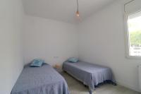 Posteľ alebo postele v izbe v ubytovaní Montsia 23 - Casa con piscina privada en Roses