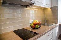 A kitchen or kitchenette at Chrysanthi's Apartment