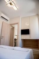 A television and/or entertainment centre at Chrysanthi's Apartment