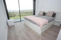 Postel nebo postele na pokoji v ubytování Casa Melocotón - Designhouse mit privatem Pool, direkt am Golfplatz