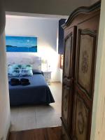 Posteľ alebo postele v izbe v ubytovaní Apartamentos El Bergantin Menorca Club