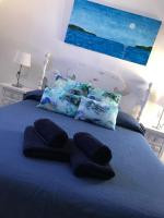 Posteľ alebo postele v izbe v ubytovaní Apartamentos El Bergantin Menorca Club
