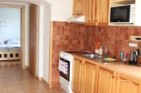 Kuchyň nebo kuchyňský kout v ubytování Apartmán Nelinka