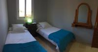 Posteľ alebo postele v izbe v ubytovaní Apartamento de lujo en puerto Santiago 1