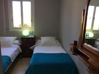 Posteľ alebo postele v izbe v ubytovaní Apartamento de lujo en puerto Santiago 1