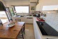 Kuchyň nebo kuchyňský kout v ubytování Villa Waves - Agios Nikolaos Anavyssos