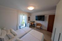 Postel nebo postele na pokoji v ubytování Villa Waves - Agios Nikolaos Anavyssos