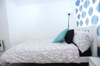 Postel nebo postele na pokoji v ubytování 2 Bedroom Apartment