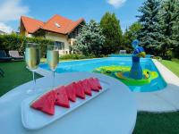 The swimming pool at or close to Villa Oliva Boutique Rooms Zamárdi