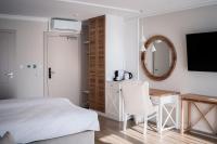 Hotel Szerokie Wody Sea & Sand Ustkaにあるベッド