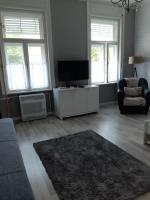 A television and/or entertainment centre at Jade Vendégház
