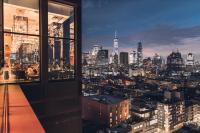 a view of a city skyline from a skyscraper at citizenM New York Times Square in New York