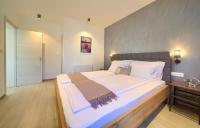 Posteľ alebo postele v izbe v ubytovaní Apartment Timmy