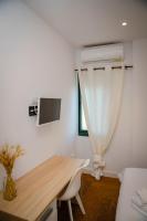 Televízia a/alebo spoločenská miestnosť v ubytovaní Hostal Restaurante Benalup Golf