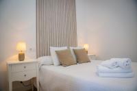 Posteľ alebo postele v izbe v ubytovaní Hostal Restaurante Benalup Golf
