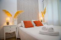 Posteľ alebo postele v izbe v ubytovaní Hostal Restaurante Benalup Golf
